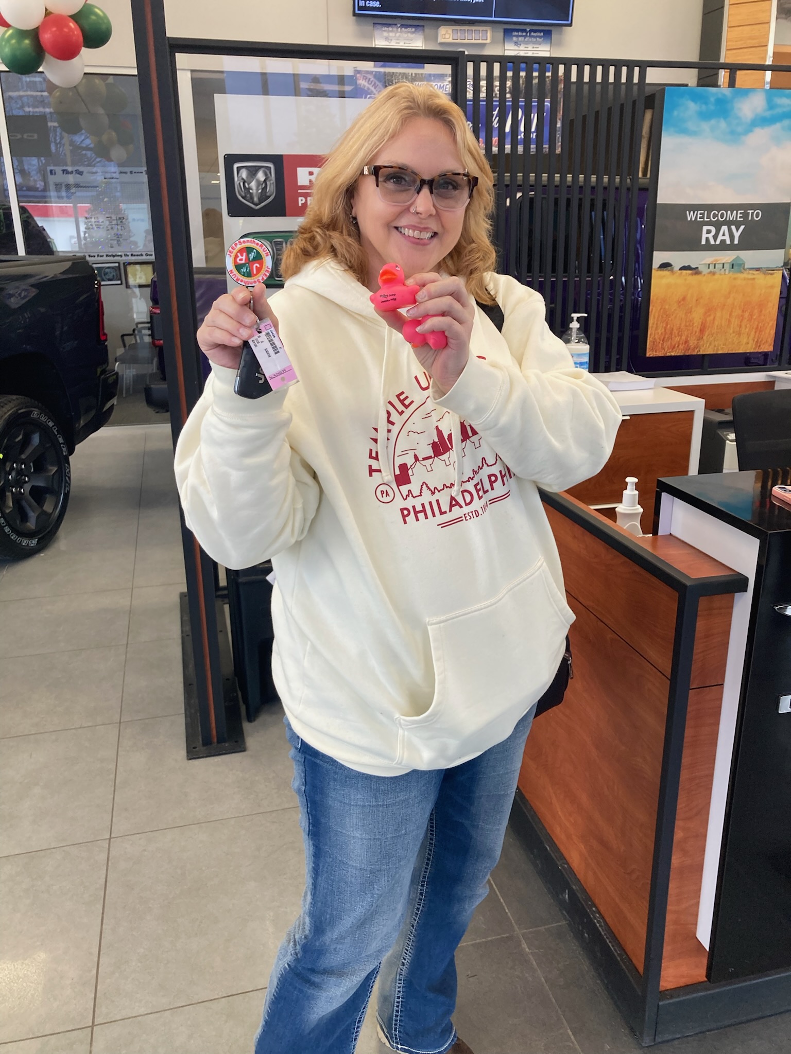 Angie receiving the keys to her new jeep! Angie receiving the keys to her new jeep!